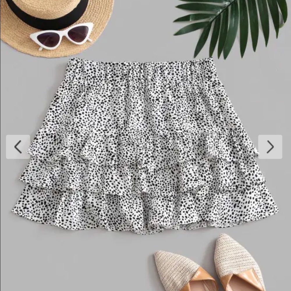 Ruffled white and black dotted skirt